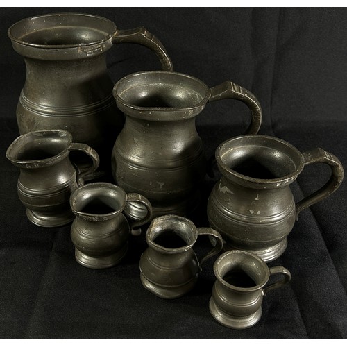 193 - Seven 19th century graduated pewter measures , two stamped James Yates, from 2 pint to 1/4 gill