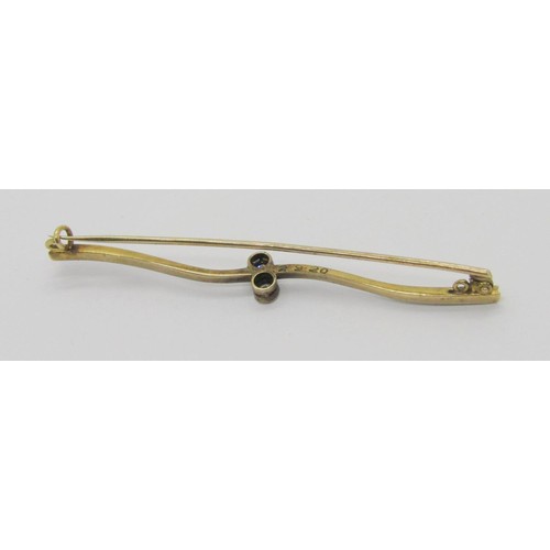 272 - Antique diamond crossover bar brooch of wavy form, set with two diamonds 0.10ct each approx, in bi-c... 