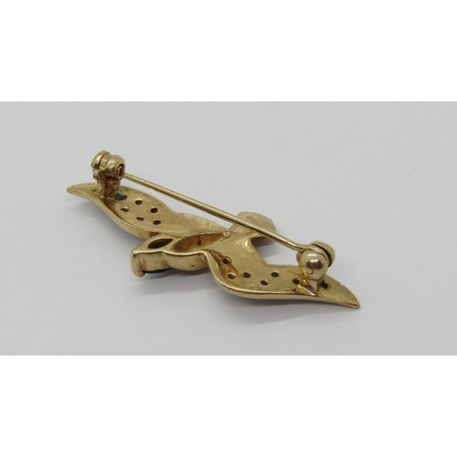 279 - Vintage 9ct bi-colour brooch in the form of a bird in flight, set with diamonds and a marquise-cut s... 