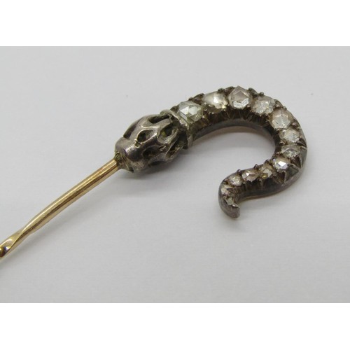 285 - 19th century yellow metal stick pin in the form of a shepherd's crook, set with graduated rose-cut d... 