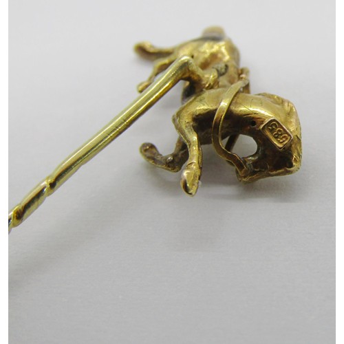 286 - 14ct figural stick pin modelled as a galloping horse, 1.8g