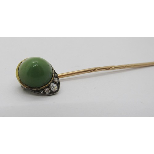 287 - Antique yellow metal jockey cap stick pin set with cabochon turquoise and three old-cut diamonds, 1.... 