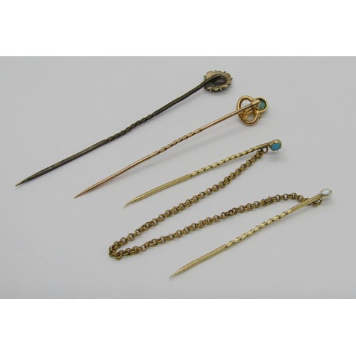 292 - Three antique stick pins comprising an Art Nouveau style 15ct turquoise example, a Victorian turquoi... 