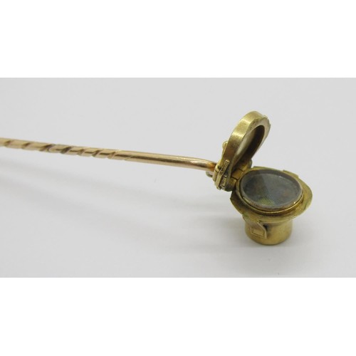 296 - 19th century novelty yellow metal mourning stick pin in the form of a hinged top hat box, 4g