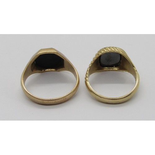 304 - Two vintage 9ct signet rings; one set with onyx, size T, the other with intaglio-cut hematite, size ... 