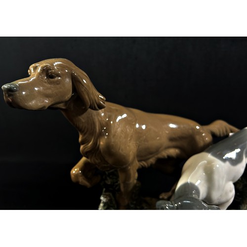 53 - A large Lladro porcelain group - attentive dogs, (Red Setter and English pointer) number 4957