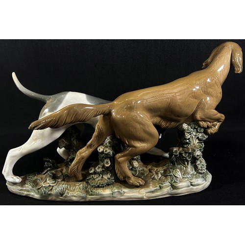 53 - A large Lladro porcelain group - attentive dogs, (Red Setter and English pointer) number 4957