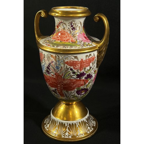 70 - An early 19th century porcelain oviform vase with open scrolled handles, hand painted detail showing... 