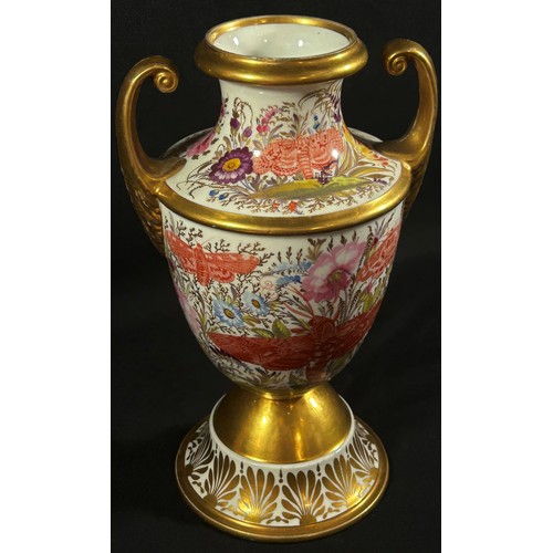 70 - An early 19th century porcelain oviform vase with open scrolled handles, hand painted detail showing... 