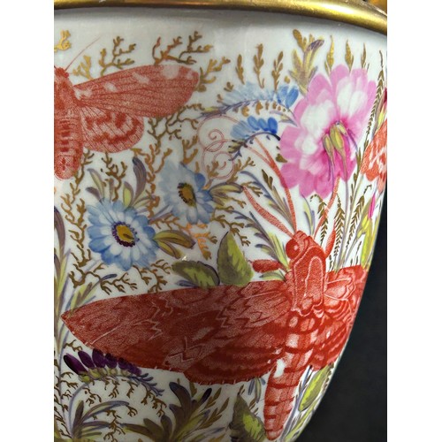 70 - An early 19th century porcelain oviform vase with open scrolled handles, hand painted detail showing... 