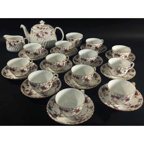 76 - A Minton Ancestral pattern tea service for 12 with Victorian style floral detail