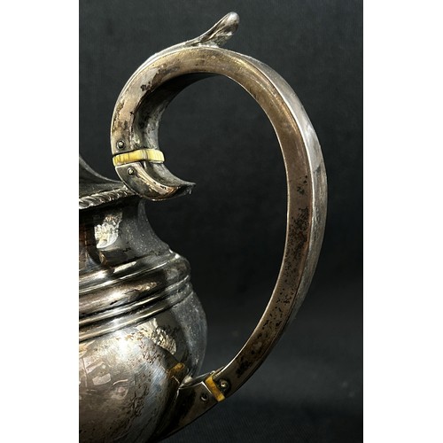 253 - A 19th century silver teapot all hallmarks rubbed, 19.4oz approximately
Ivory licence reference: NGH... 