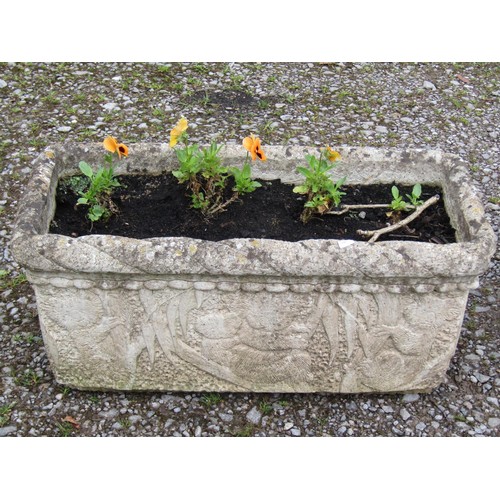 1008 - Two weathered cast composition stone rectangular flower troughs of varying design with relief detail... 