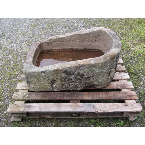 1014 - A weathered carved natural stone rectangular trough with rounded end and corners, 40 cm (full height... 