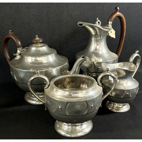 180 - A five piece silver plated Georgian style tea service, and a three piece hammered pewter tea service