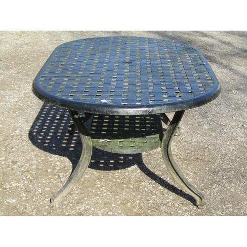 1009 - A good quality contemporary heavy gauge cast alloy five piece garden terrace set comprising oval two... 