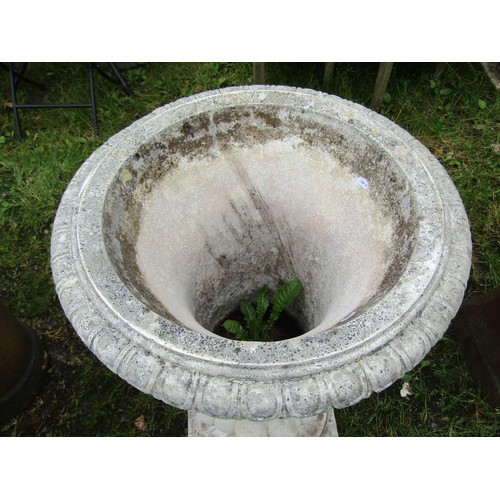 1019 - A large painted cast composition stone campana shaped garden urn with flared egg and dart rim, lobed... 