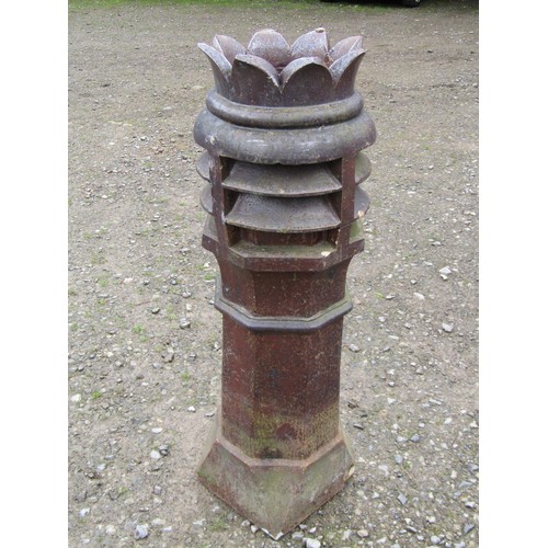 1021 - A Victorian salt glazed octagonal chimney pot with louvre vented and crown top, 104 cm high (af)