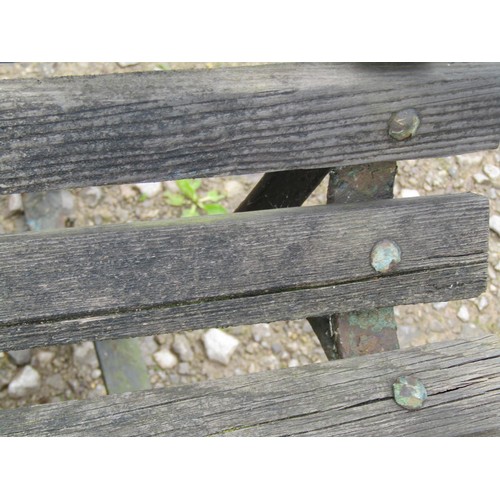 1024 - A vintage sprung steel garden bench with wooden slatted seat and combined back, 183 cm (6ft) long