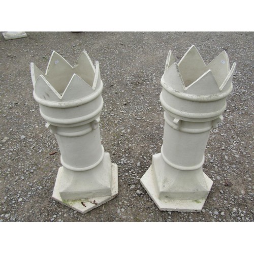 1035 - A Pair of painted crown top cylindrical chimney pots set on platform bases, 93 cm (full height)