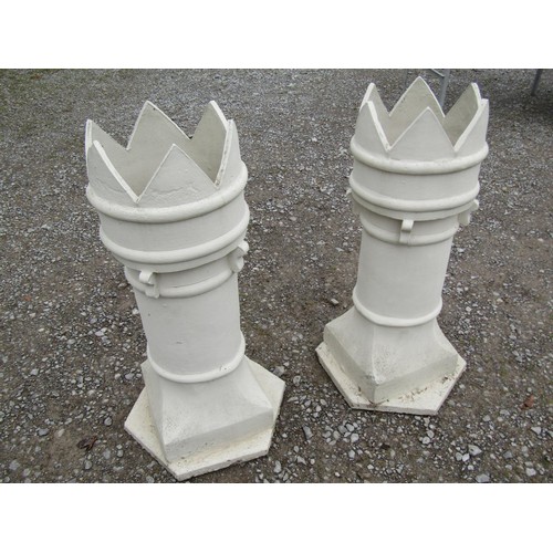 1035 - A Pair of painted crown top cylindrical chimney pots set on platform bases, 93 cm (full height)