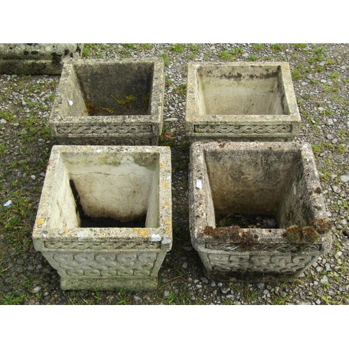 1045 - A set/run of four small weathered square tapered cast composition stone planters with repeating reli... 