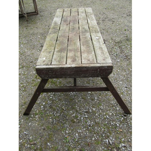 1046 - A weathered Hattersley Keighley teak garden table, the rectangular slatted top raised on splayed 'A'... 