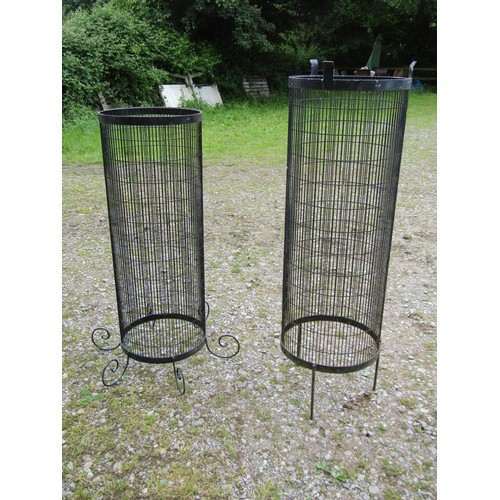 1047 - Nine contemporary cylindrical wire mesh tree guards (slight variation in size and supports), the lar... 