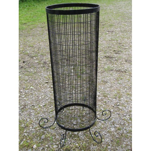 1047 - Nine contemporary cylindrical wire mesh tree guards (slight variation in size and supports), the lar... 