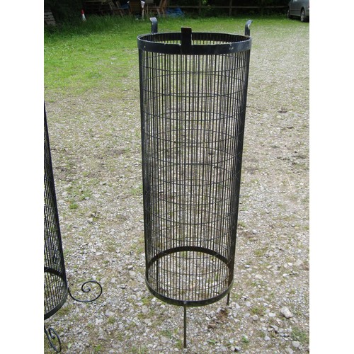 1047 - Nine contemporary cylindrical wire mesh tree guards (slight variation in size and supports), the lar... 