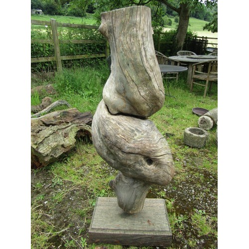 1056 - A weathered garden tree art sculpture mounted on a bespoke rectangular platform base 126 cm high