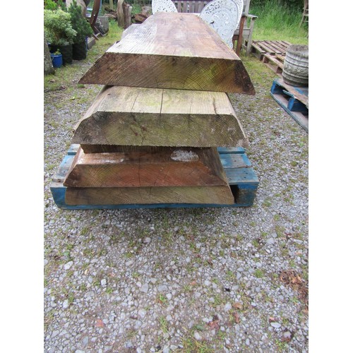 1064 - Five rough mill cut slices of timber, the longest section approx 2 metres long, the others 60 cm app... 