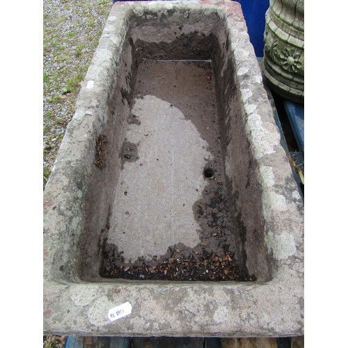 1069 - A weathered carved rectangular natural stone trough with small drilled circular drainage hole, 23 cm... 