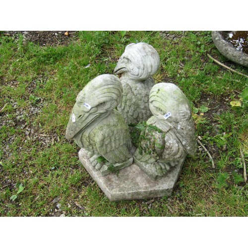 1075 - A novelty sectional weathered cast composition stone bird bath, the circular shell shaped top raised... 