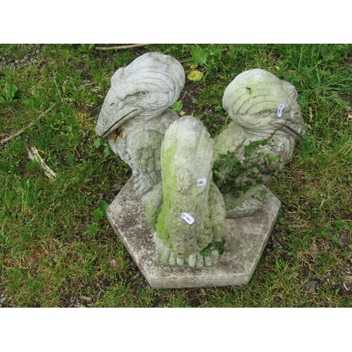 1075 - A novelty sectional weathered cast composition stone bird bath, the circular shell shaped top raised... 