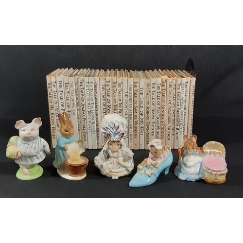 59 - A group of Beatrix Potter books together with five Beatrix Potter porcelain figure groups