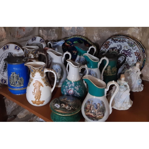 92 - A collection of 9th century Prattware and other pieces comprising several jugs, ironstone plates, Ca... 