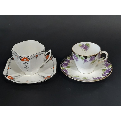 126 - An art deco Shelley Red Daisy Queen Anne tea set for six, Royal Doulton coffee service with violet b... 