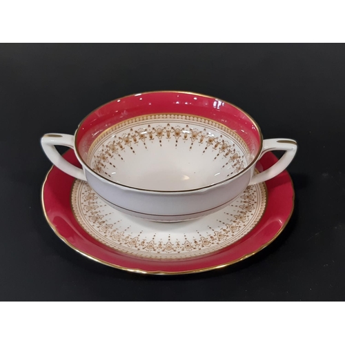 20 - A quantity of Royal Worcester 'Regency' pattern tea and dinner wares in crimson and gilt colourway c... 