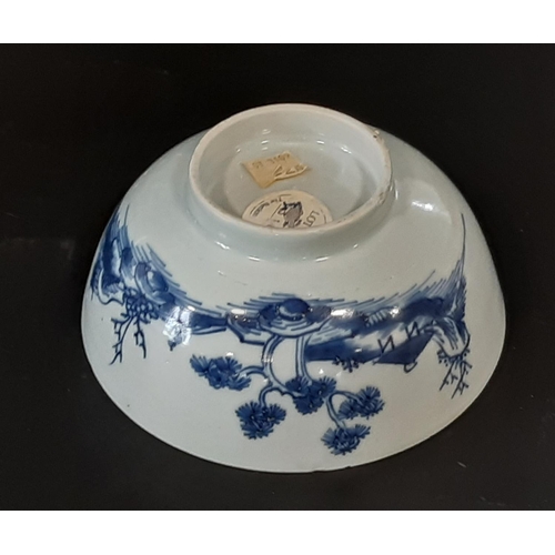 37 - A Chinese Nanking cargo blue and white porcelain footed bowl, decorated with village scenes, sticker... 