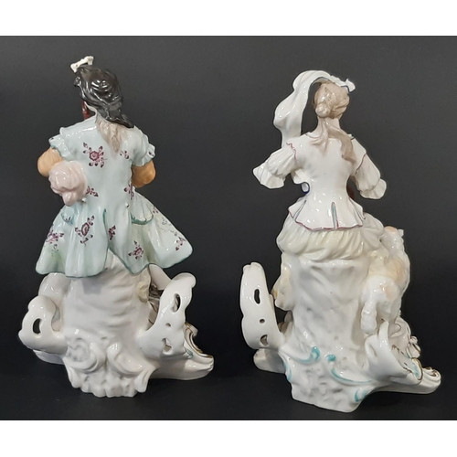 71 - A pair of 18th century Derby figures of a shepherd and shepherdess, with pipe and lute, hand painted... 