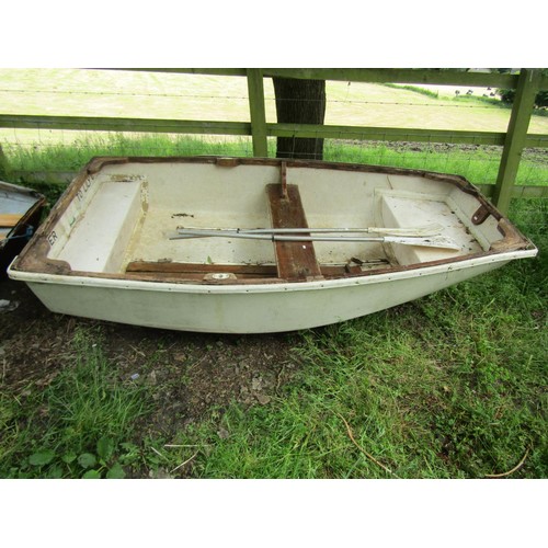 1111 - A small rowing boat with painted fibreglass hull, teak trim and seat, 232 cm x 130 cm approximately ... 