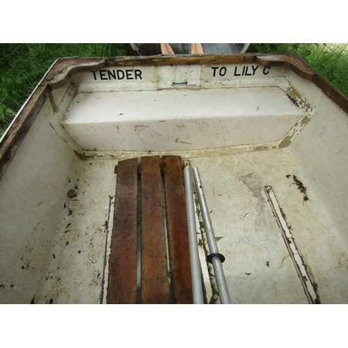 1111 - A small rowing boat with painted fibreglass hull, teak trim and seat, 232 cm x 130 cm approximately ... 