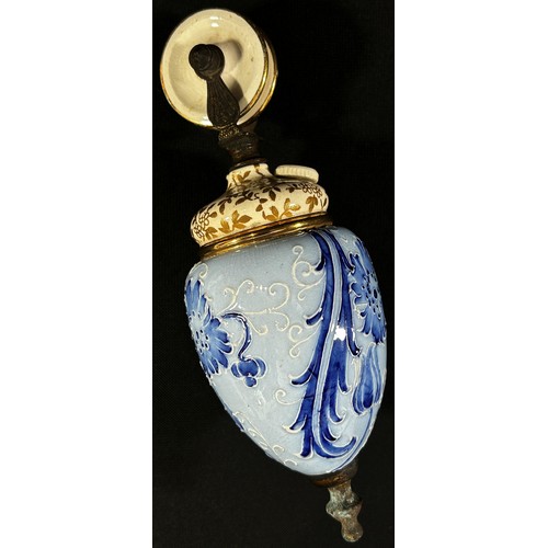 448 - A Moorcroft ceramic counter balance from a rise and fall light decorated in a blue and white floral ... 