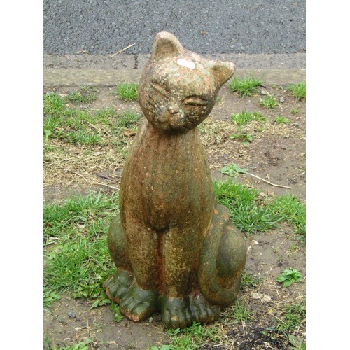 1128 - A weathered terracotta garden ornament in the form of a seated cat, 50 cm high approximately