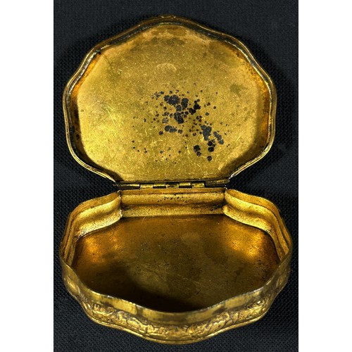 449 - An early 19th century snuff box with gilded brass frame and inset composite panels, 7cm max