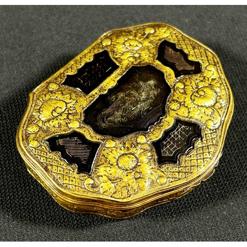 449 - An early 19th century snuff box with gilded brass frame and inset composite panels, 7cm max