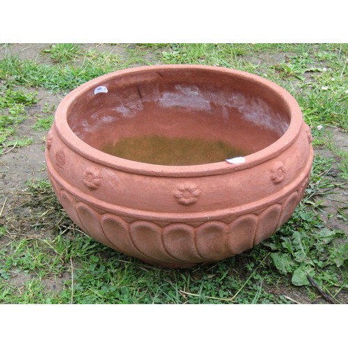 1137 - Two Italian terracotta planters of various size and design with relief detail, the largest example28... 