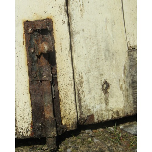 1095 - A pair of painted wooden entrance gates with sloping chamfered rails and through jointed constructio... 