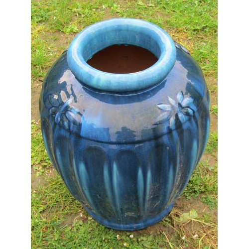 1147 - A good quality heavy contemporary blue glazed oviform jar with moulded flower head and fluted detail... 